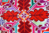 Pink red and white cross-stitched blouses Mexico