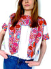 Pink red and white cross-stitched blouses Mexico