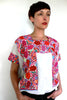 Pink red and white cross-stitched blouses Mexico