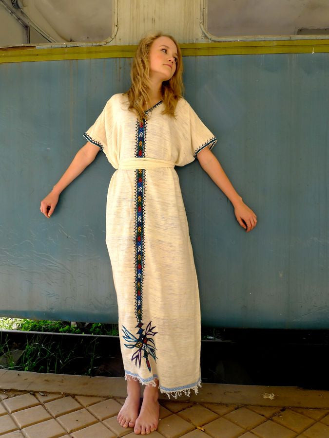 White traditional Ethiopian dress with multicolored embroidery FTWWL White traditional Ethiopian dress with multicolored embroidery FTWWL