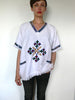 White traditional Ethiopian tunic with multicolored cross embroidered motif