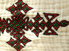 White traditional Ethiopian dress with Green  Red and Gold, cross embroidered motif