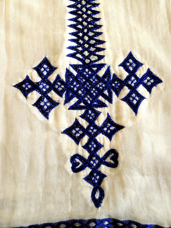 White traditional Ethiopian dress with blue cross embroidered motif FTWWL White traditional Ethiopian dress with blue cross embroidered motif FTWWL