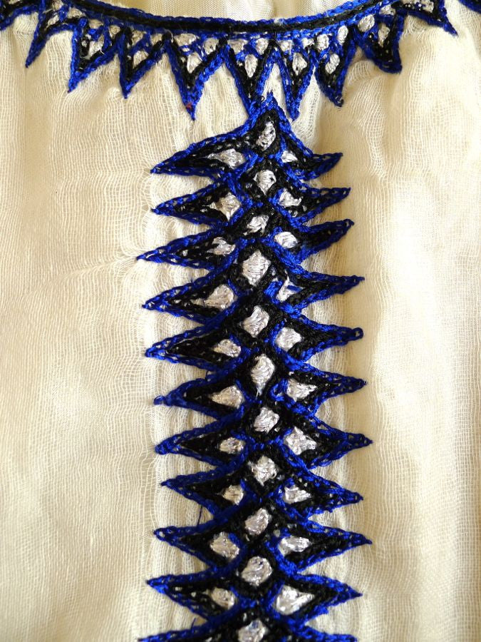 White traditional Ethiopian dress with blue cross embroidered motif FTWWL White traditional Ethiopian dress with blue cross embroidered motif FTWWL