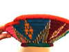 Pink,red  green and blue handwoven basket from Labilela