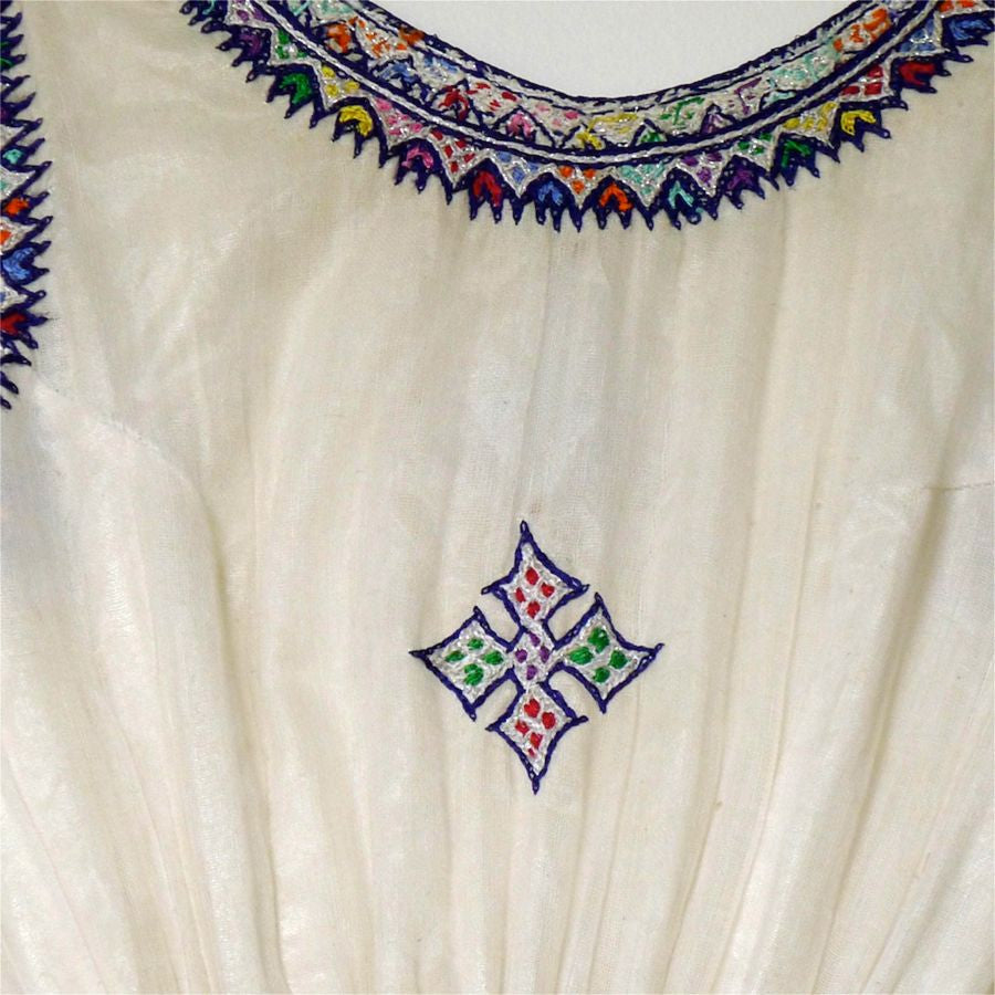 White, sleeveless traditional Ethiopian dress with multicolored cross – FTWWL White, sleeveless traditional Ethiopian dress with multicolored cross – FTWWL
