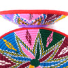 Pink,red  green and blue handwoven basket from Labilela